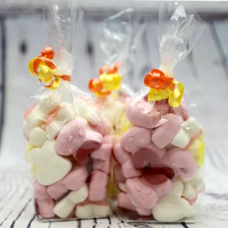 OK, so not the best named sweet in the world, but they do taste delicious! 150g of fruity gummy delights, packaged in one of our Easter bags and presented with Ribbon. Perfect!