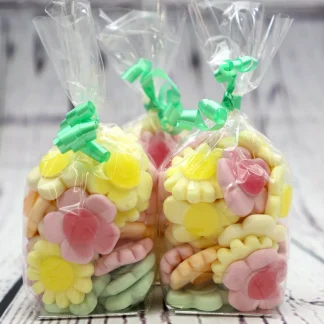 Our Kingsway Happy Flowers look great packaged up for Easter! 150g of lovely chewy Kingsway Happy Flowers presented in one of our Easter treat bags with ribbon. Perfect!