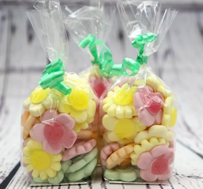 Our Kingsway Happy Flowers look great packaged up for Easter! 150g of lovely chewy Kingsway Happy Flowers presented in one of our Easter treat bags with ribbon. Perfect!