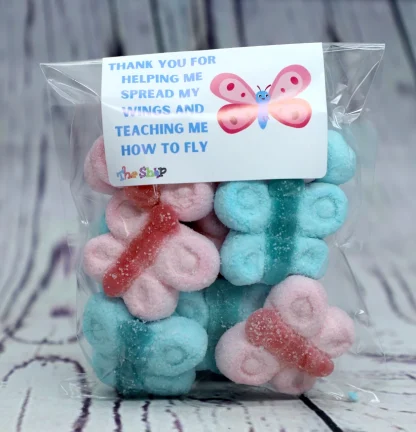 A present for that special person that helps you grow. Mallows, shaped like butterflys in a novelty bag.